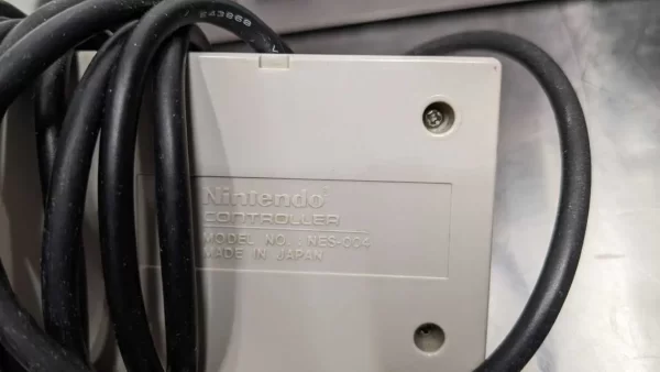 NES-001, Nintendo, Console and 2 Controllers NES-004 Power Adapter NES-002 RF Switch NES-003